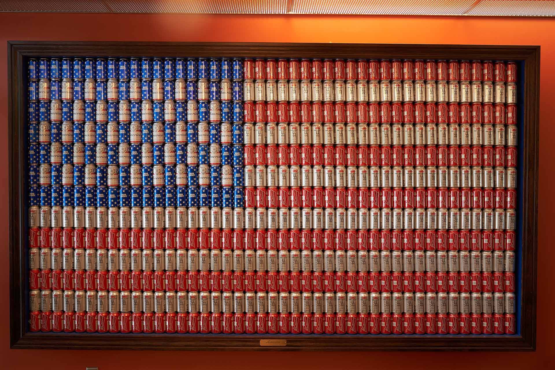 A mural of Brown Distributing's beer cans in the design of the American flag